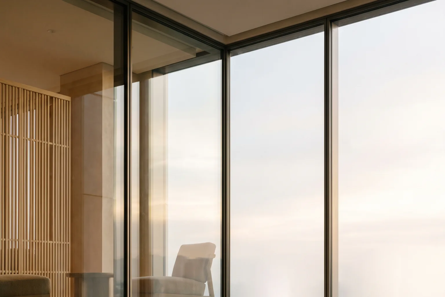 A high-floor view over the financial district at blue hour